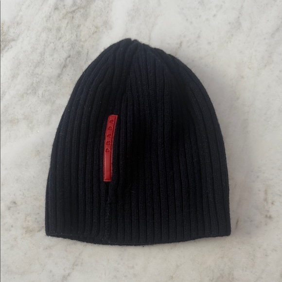 Prada Black Ribbed Beanie with Red Tag